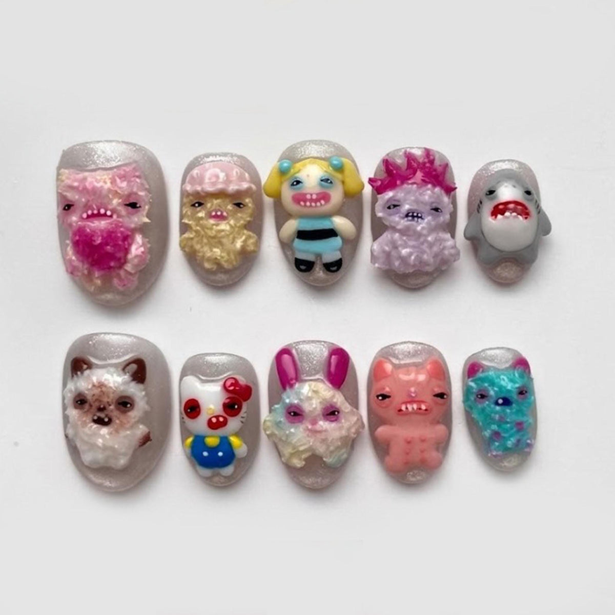 3D Weirdcore Monster Press On Nails in Pink, Purple, Aqua, and Yellow