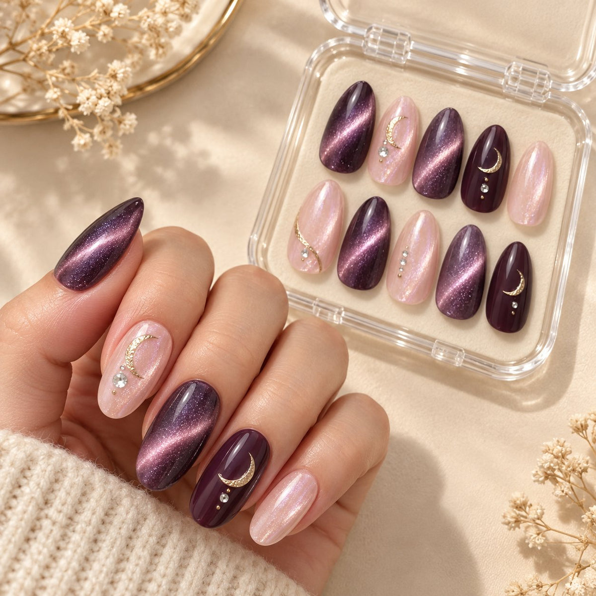 Amethyst Moon Celestial Nails With Gold Crescents and Crystal Accents worn on hand with acrylic storage box