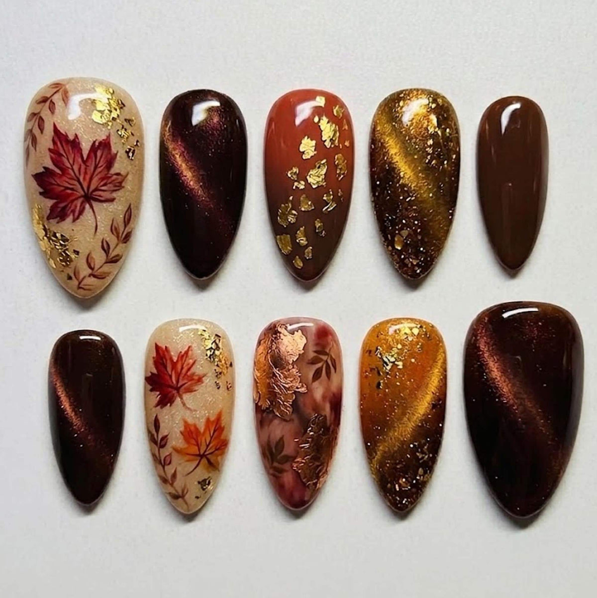 Autumn Maple Leaf Cat Eye Nails with Gold Foil