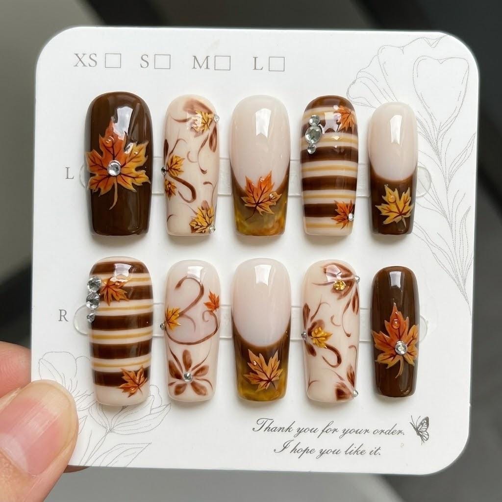 Autumn Maple Leaf Press On Nails With Brown, Cream and Gold Stripes