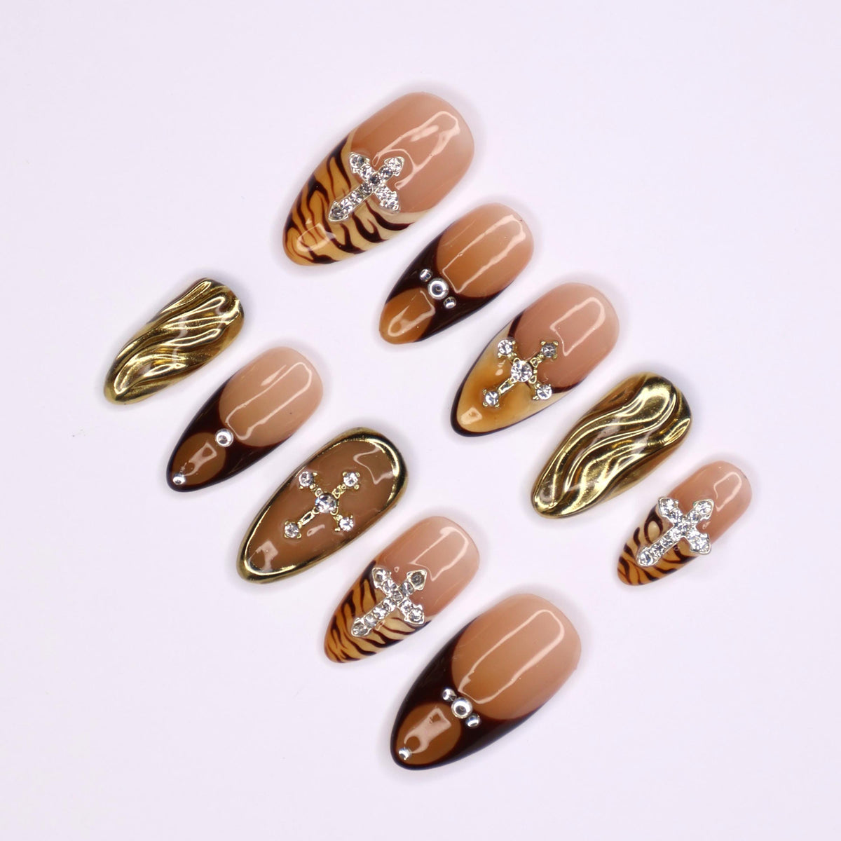 Autumn Tiger Print French Tip Nails with Rhinestone Crosses and Gold Chrome