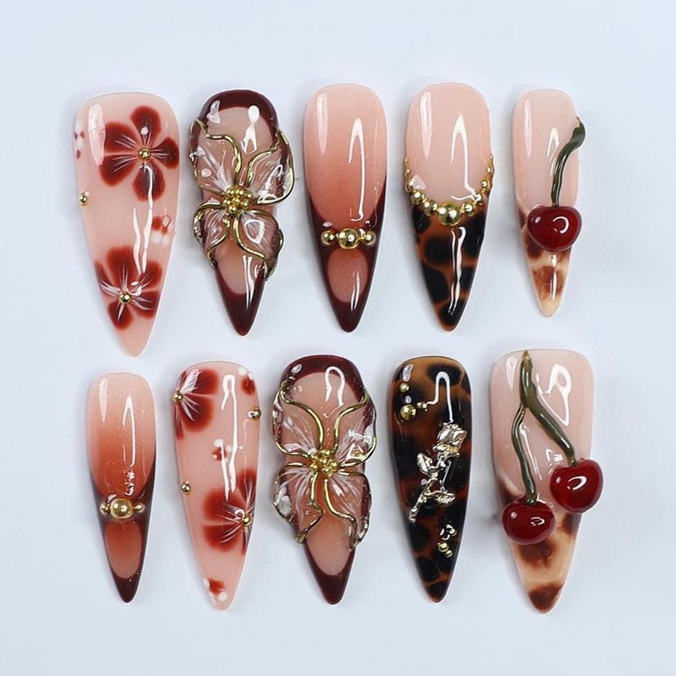 Autumn Tortoise Shell Nails with Sculpted Flowers, Cherry Details, and Gold Accents