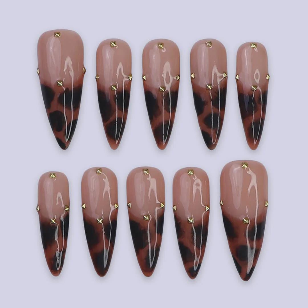 Autumn Tortoiseshell French Tip Nails With Gold Stud Accents