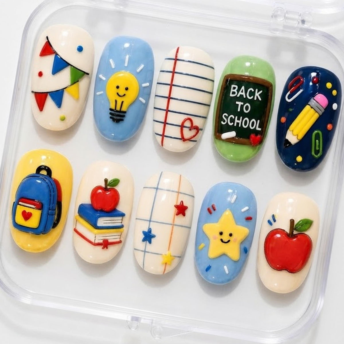 Back-to-School 3D Nail Set With Apples, Books, Pencils, and Classroom Details