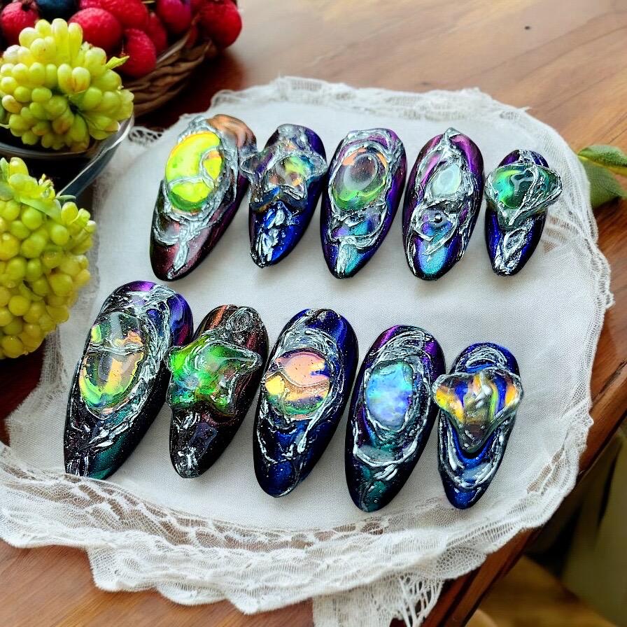 Black and Navy Cyber Nails with Iridescent Swirls and Raised Star Details