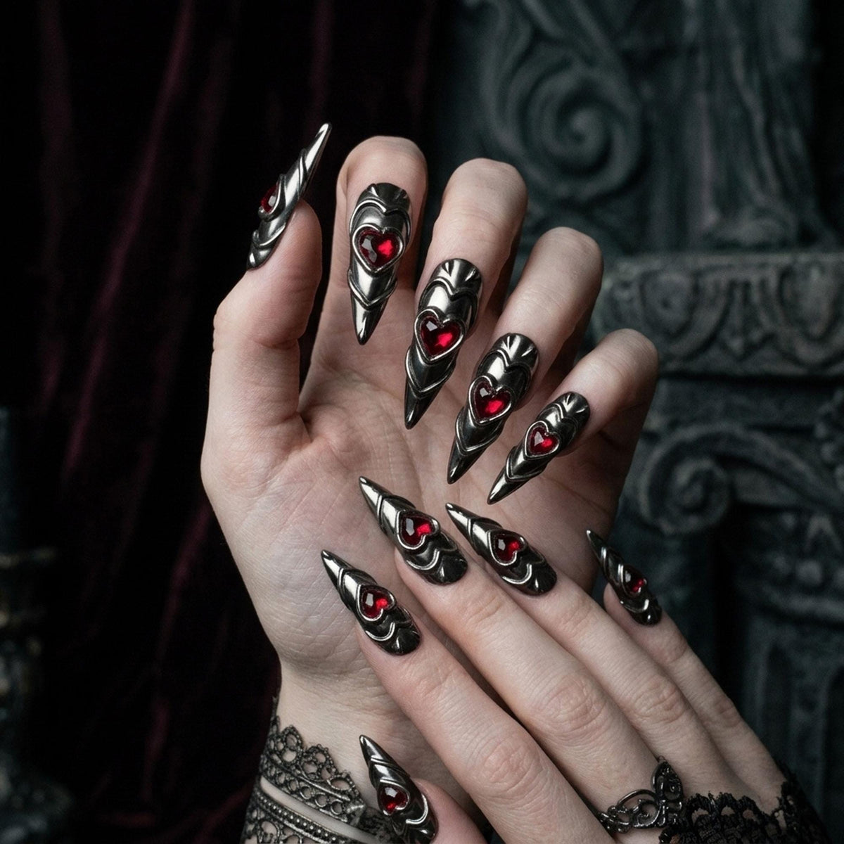 Black and Silver Chrome Gothic Armor Nails with Red Heart Gems