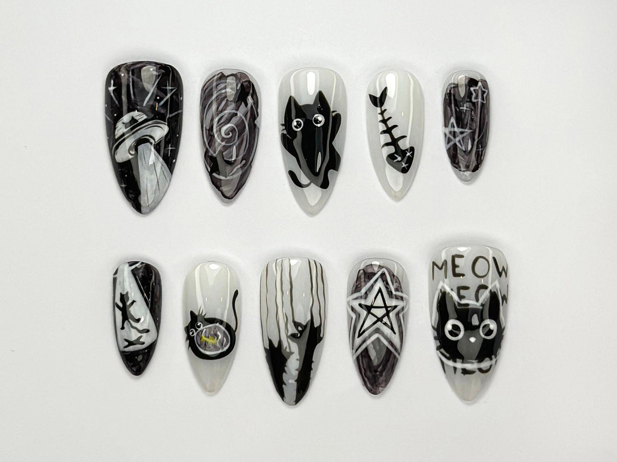 Black and White Cosmic Cat Nail Set with Stars and Spooky Motifs