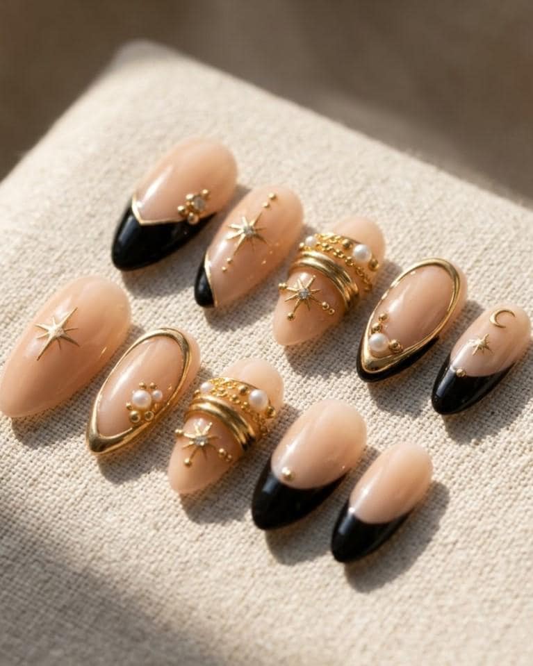 Black French Tip Press-On Nails with Gold Celestial and Pearl Details