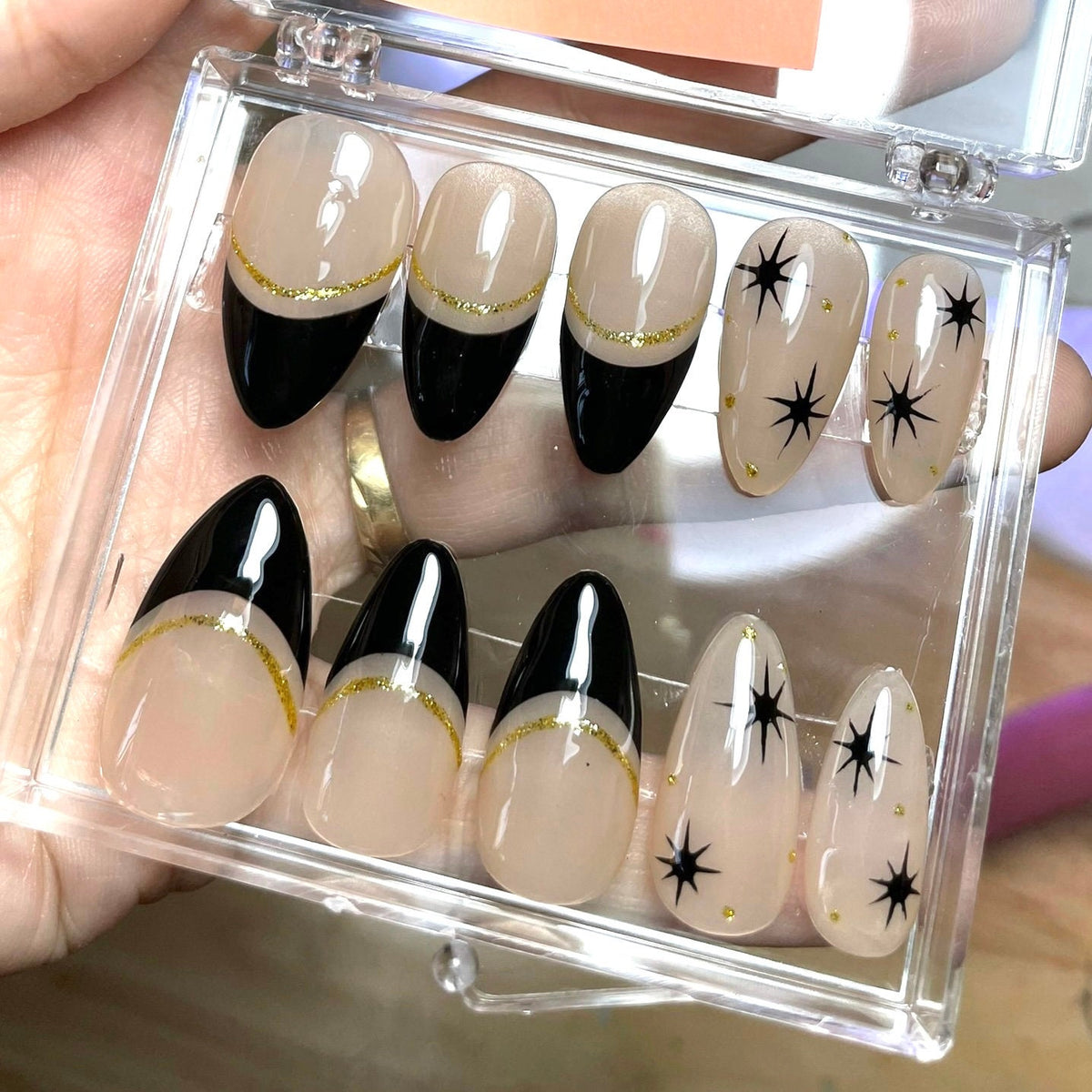 Black French Tip Press On Nails With Gold Glitter and Starburst Accents