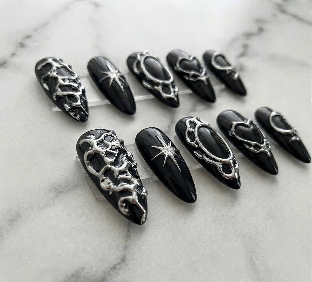 Black Gothic Chrome Nails With Silver Sculptural Hearts, Stars and Celestial Details