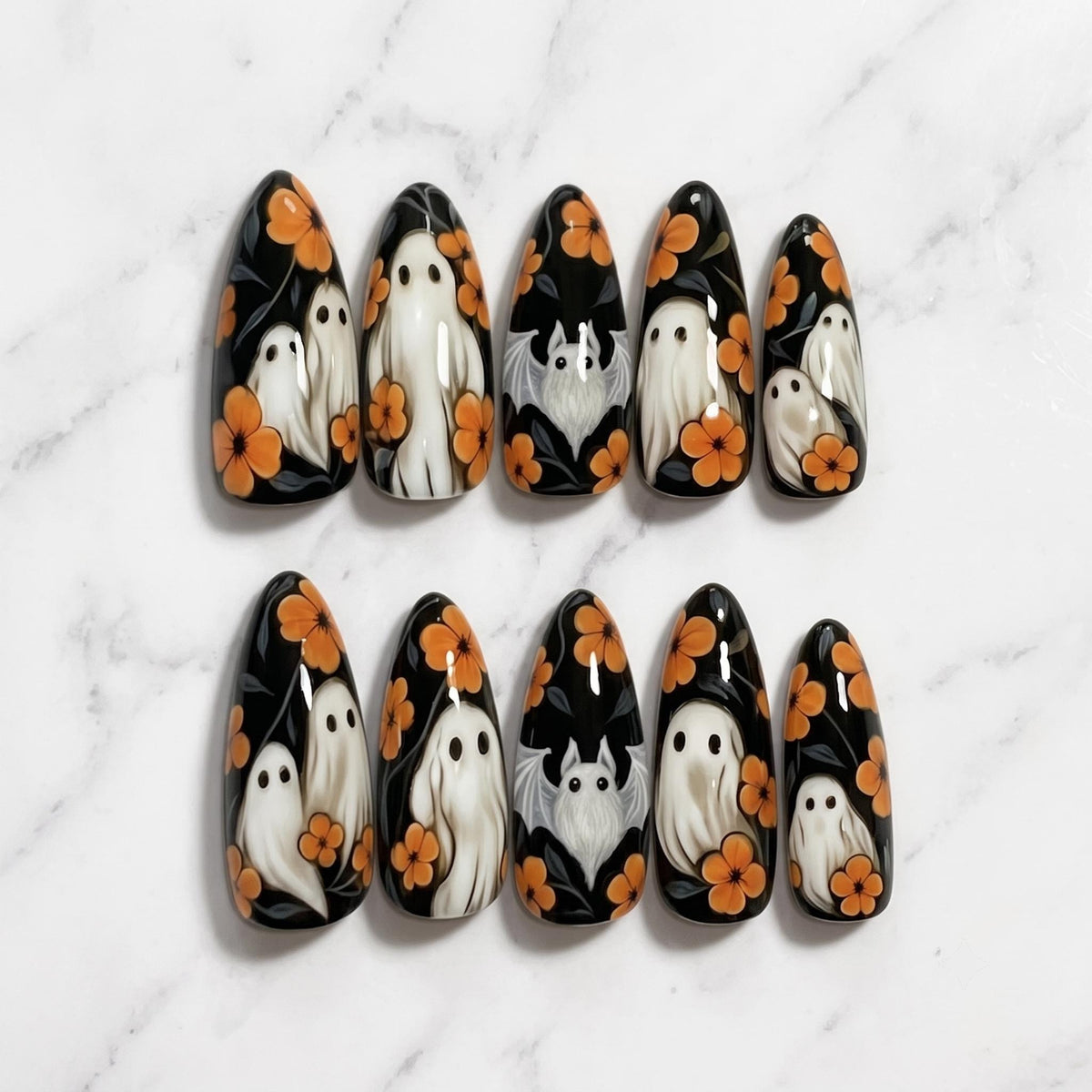 Black Halloween Ghost Nails With Orange Flowers and Dark Foliage