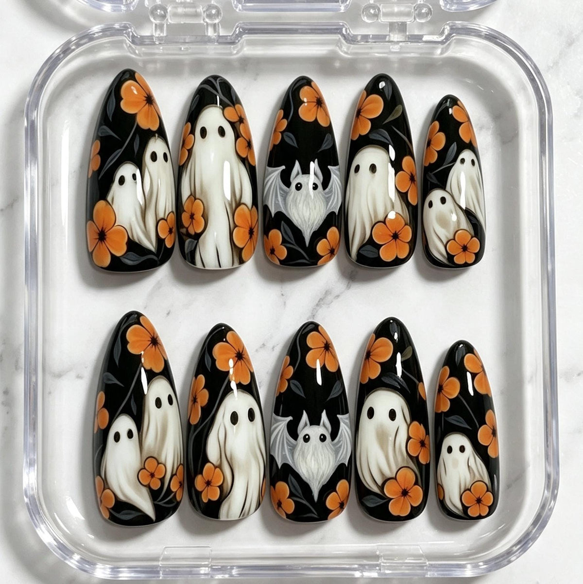 Black Halloween Ghost Nails With Orange Flowers and Dark Foliage