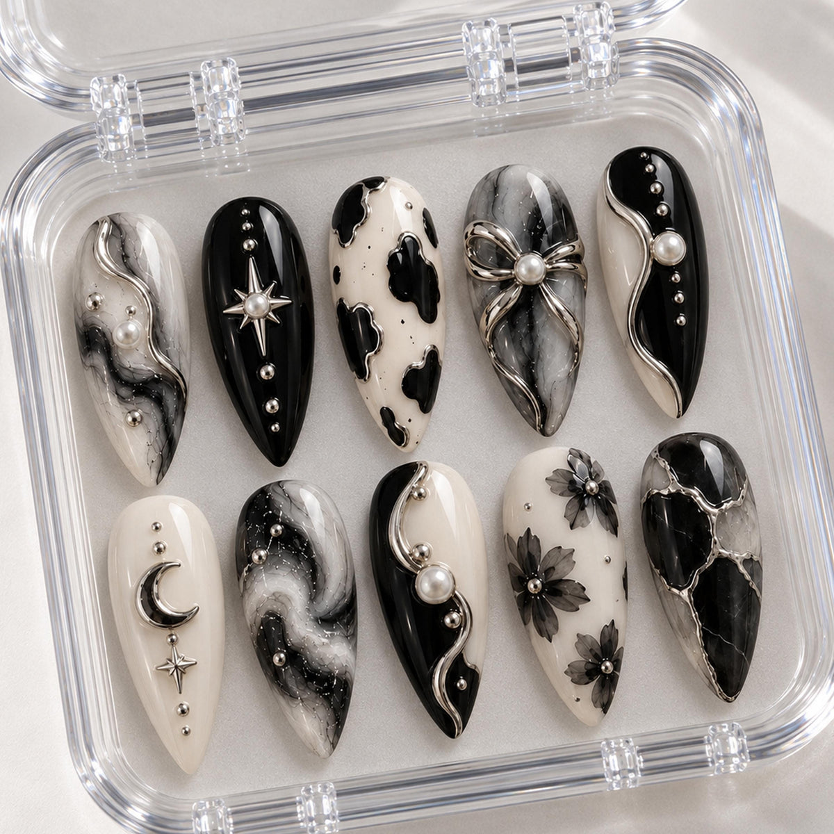Black, Ivory & Gray Marble Cow Print Nails With Chrome Bows and Pearls