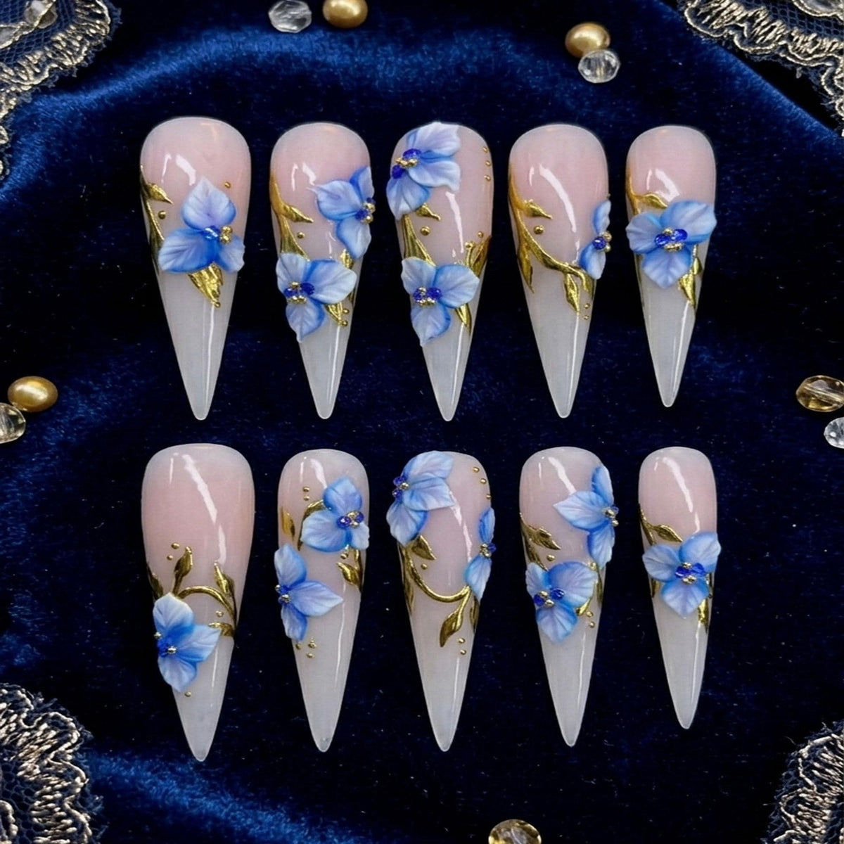 Blue 3D Floral Press On Nails with Gold Accents on Sheer Nude Pink