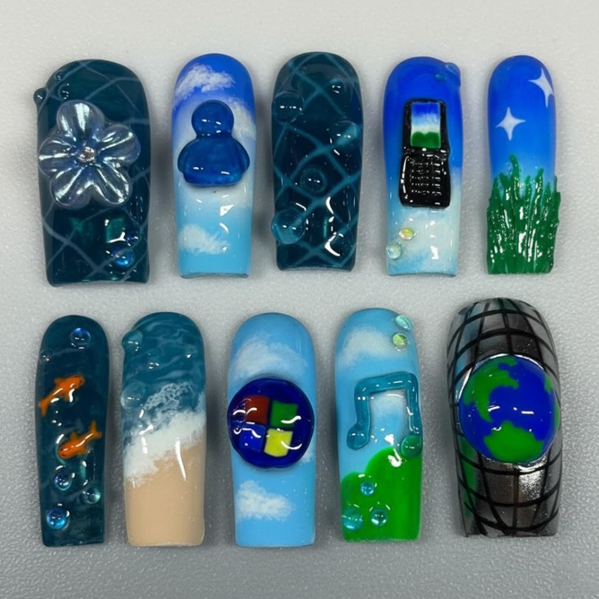 Blue Aqua Frutiger Aero Nails with 3D Water Droplets, Silver Flower, Globe and Phone Details