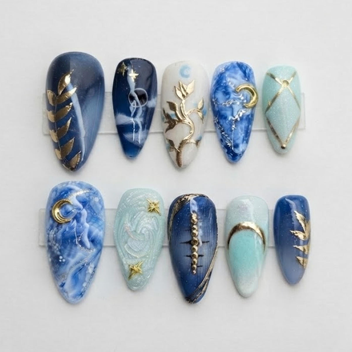 Blue Celestial Marble Press-On Nails With Gold Moon and Star Details