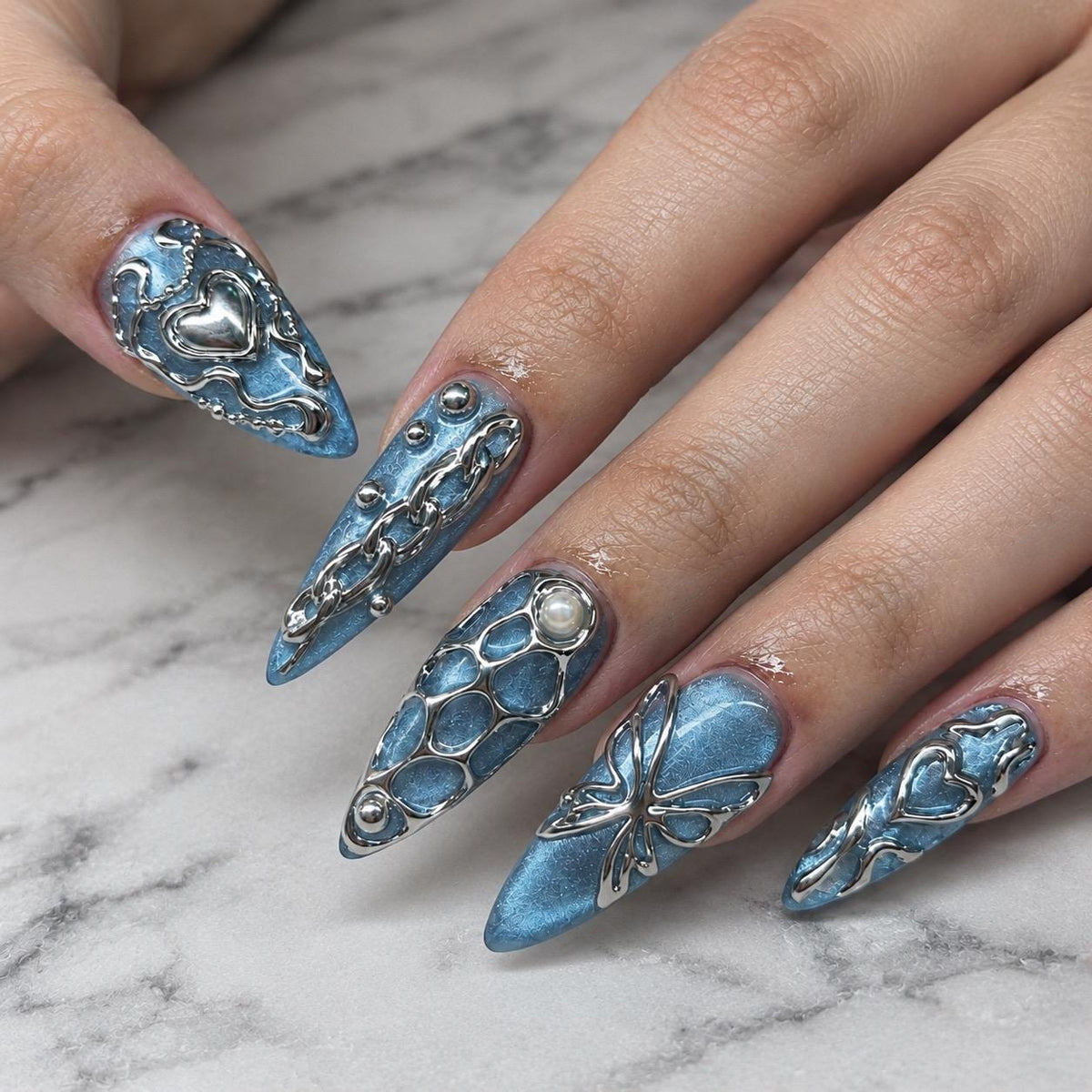 Blue Chrome Press On Nails With Silver Chains and Butterfly Detail