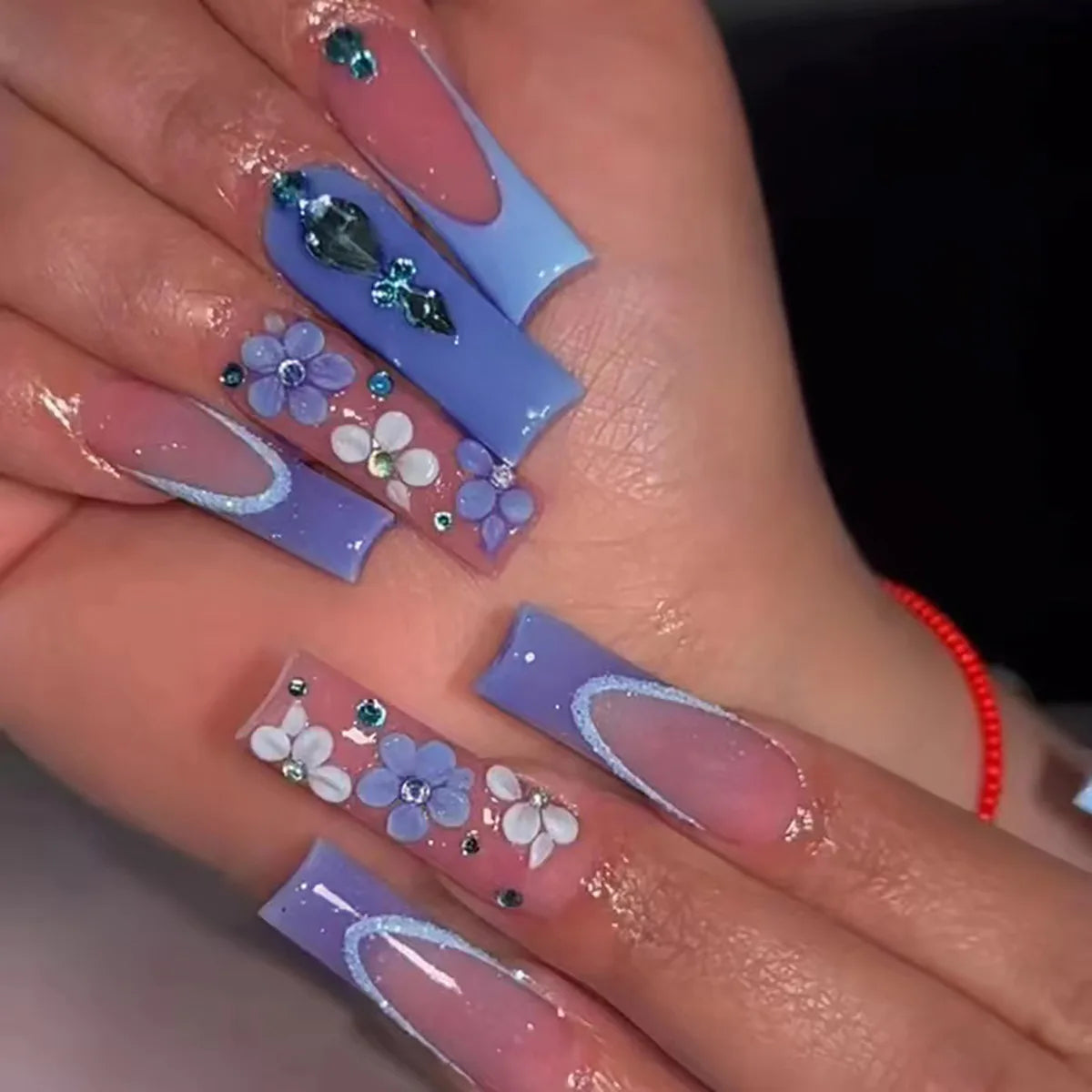 Blue French Tip Nails With Raised Flowers, Rhinestones and Silver Glitter