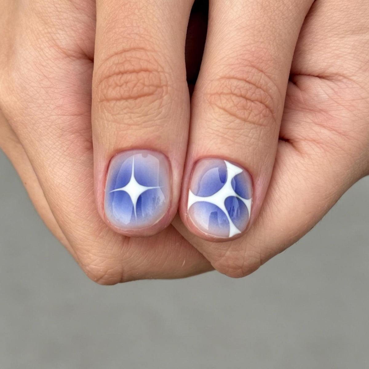 Blue Ombre Starburst Press-On Nails With White Abstract Accents