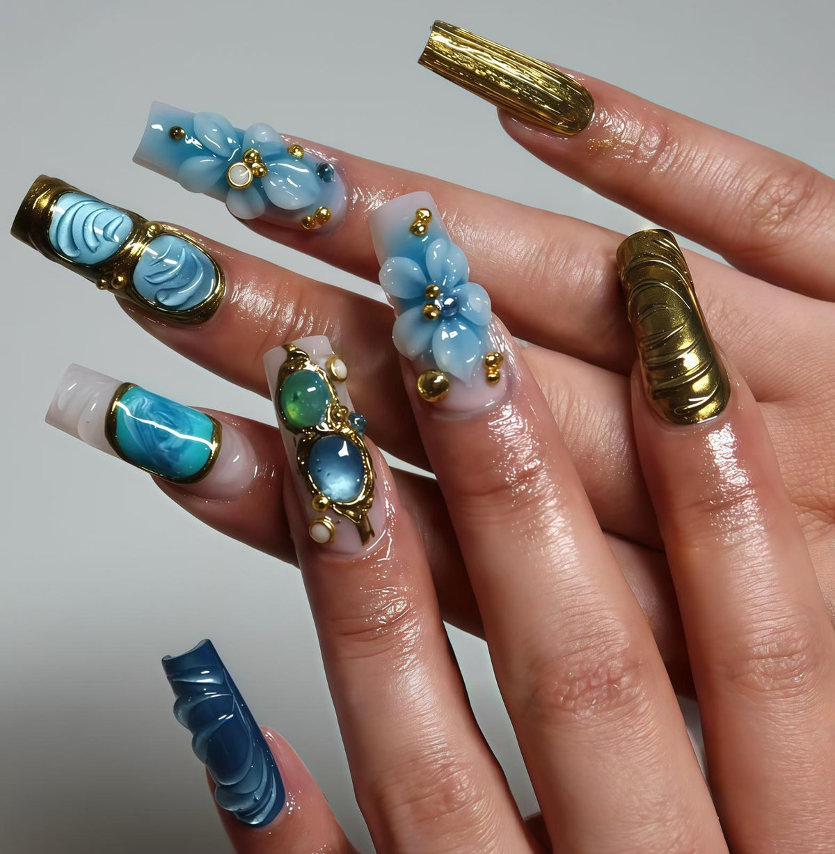 Blue Sculpted Flower and Gold Nail Set With Jeweled Accents