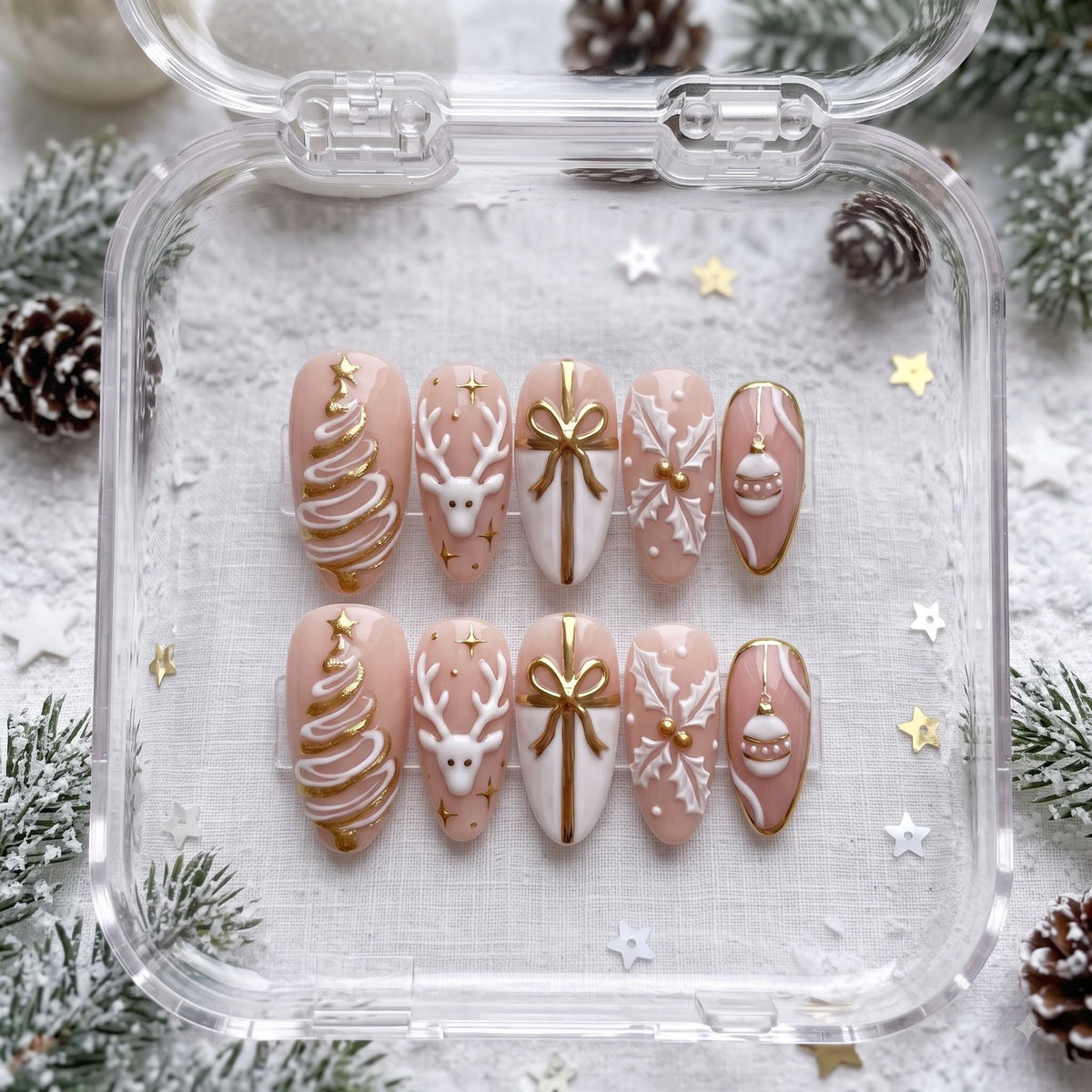 Blush Christmas Press On Nails With Gold Reindeer, Trees, Bows and Snowflakes