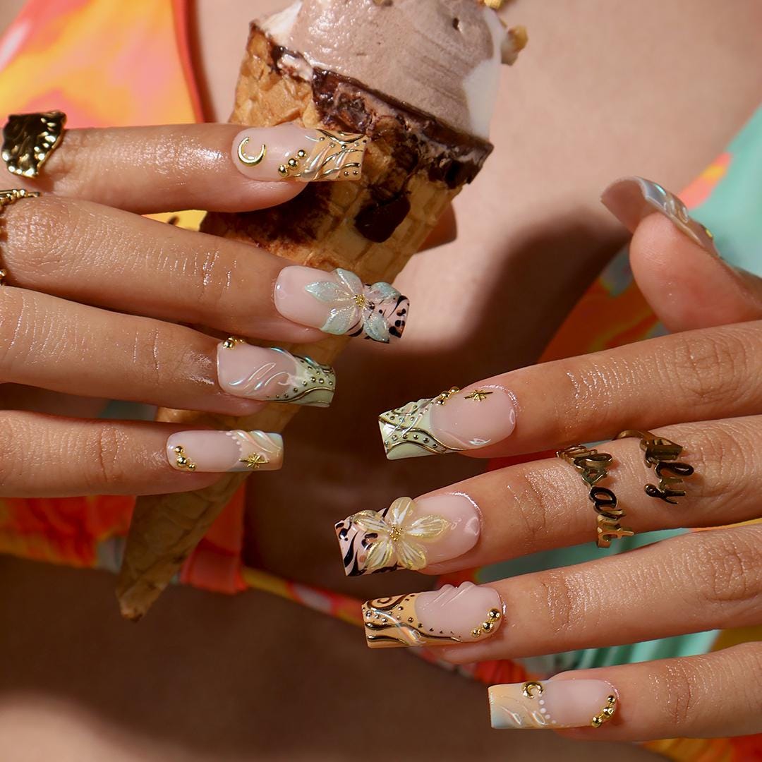 Blush Nude Celestial Floral Nails With Gold Chrome and Animal Print