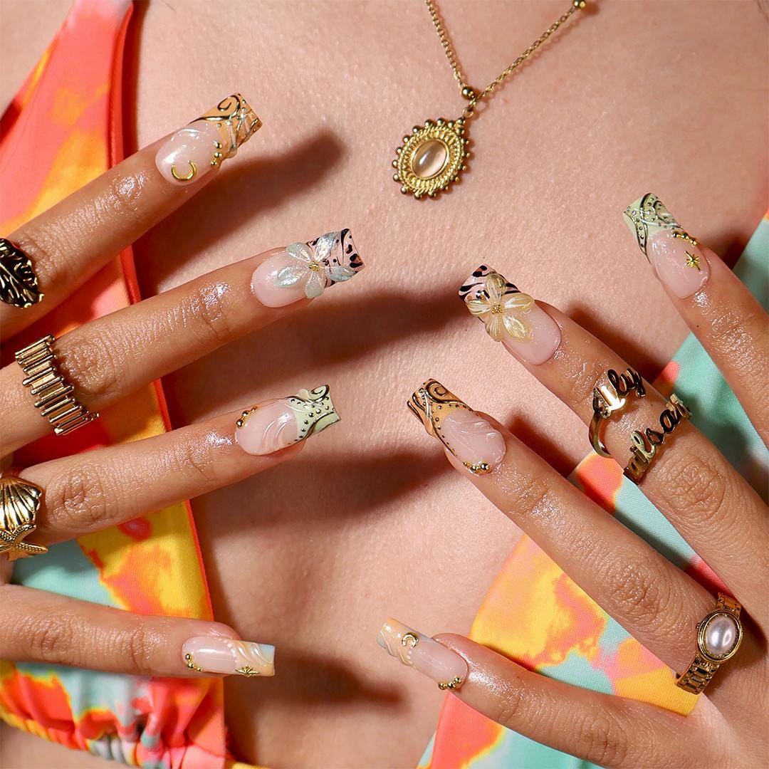 Blush Nude Celestial Floral Nails With Gold Chrome and Animal Print