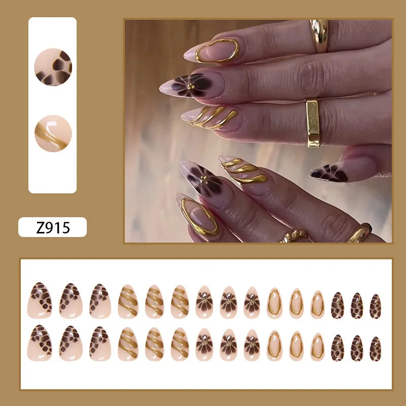 Blush Nude Leopard Print Nails with Gold Chrome Outlines and Starburst Accents