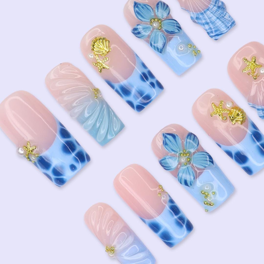 Blush Pink and Blue Ocean Nails with Tropical Flowers, Shells and Gold Charms