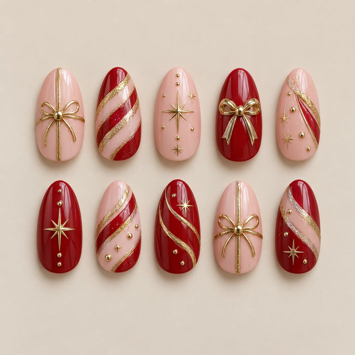 Blush Pink And Cherry Red Candy Cane Nails With Gold Bows And Glitter