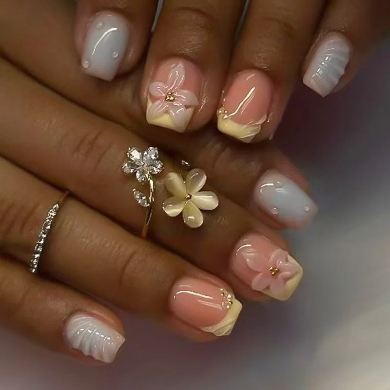 Blush Pink and Cream French Tip Nails with Raised Flowers and Gold Accents