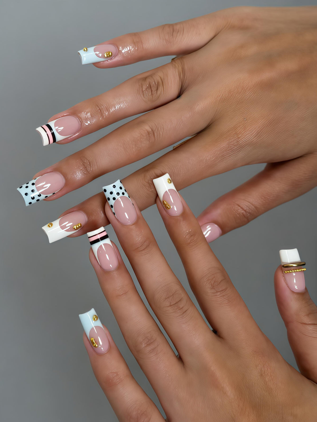 Blush Pink French Tip Nails With Polka Dots, Stripes, and Gold Studs