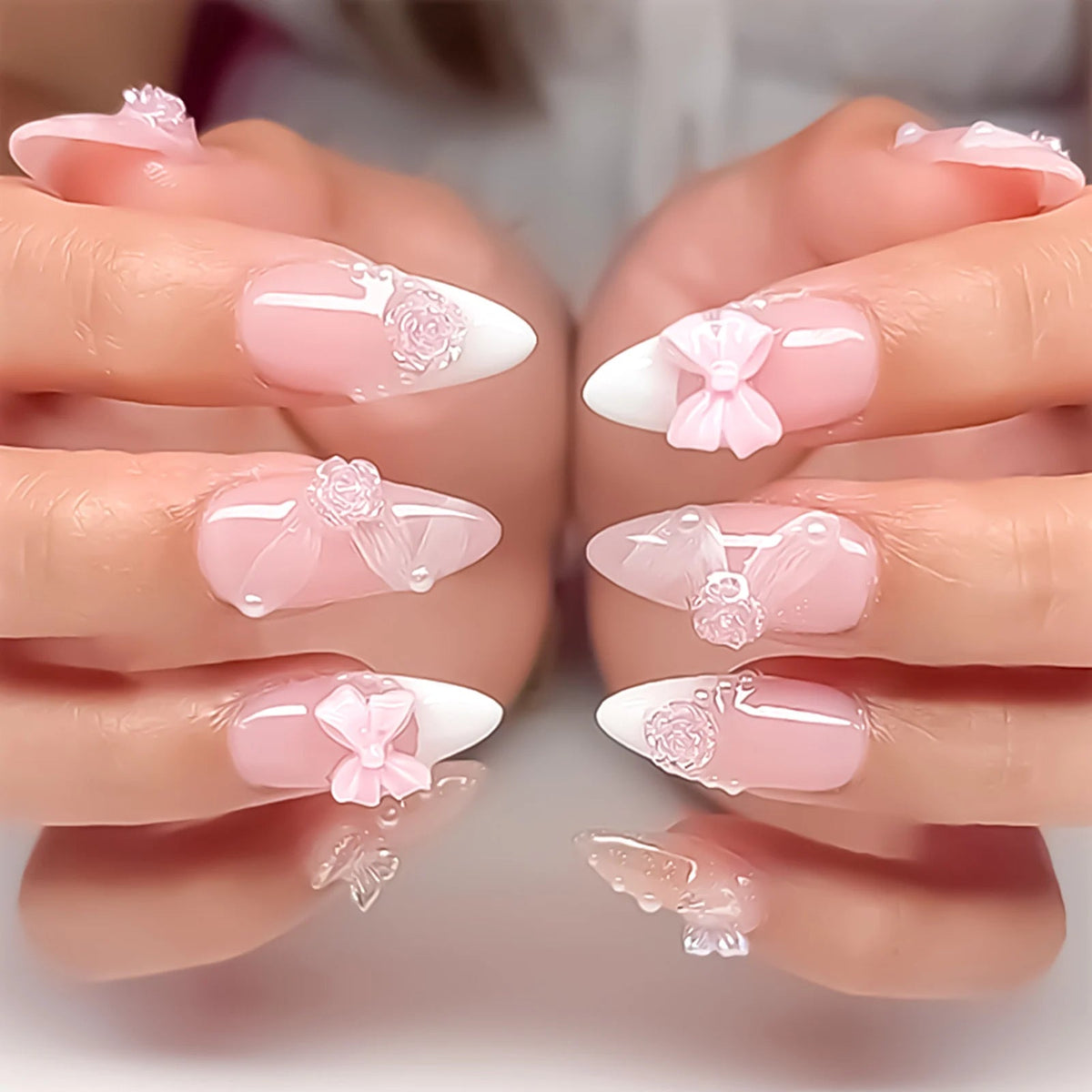 Blush Pink French Tip Nails With Raised Bows, Flowers and Pearl Details