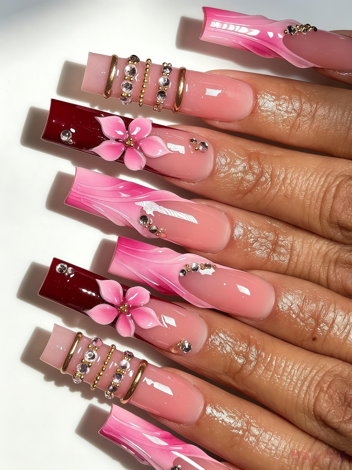 Blush Pink Marbled Tip Nails with 3D Flowers, Burgundy Accents, Gold Bands and Rhinestones