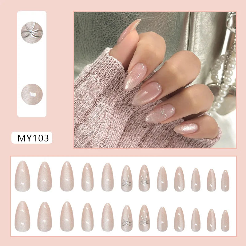 Blush Pink Shimmer Nails With Silver Bow and Starburst Details