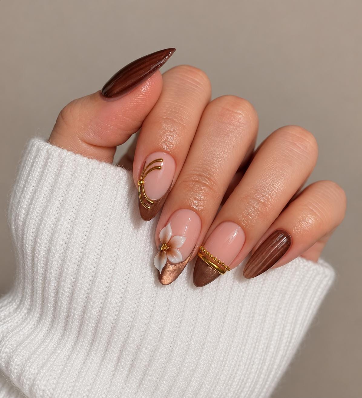 Brown Cat-Eye and Blush Floral Nails with Gold Metallic French Tips