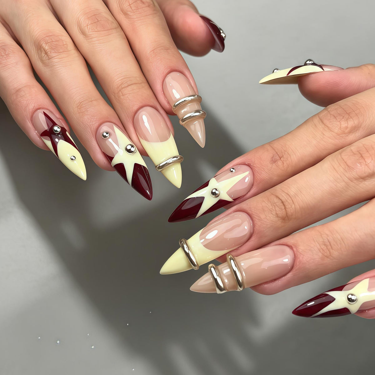 Burgundy and Butter Yellow Starburst Nail Set with Silver Rings
