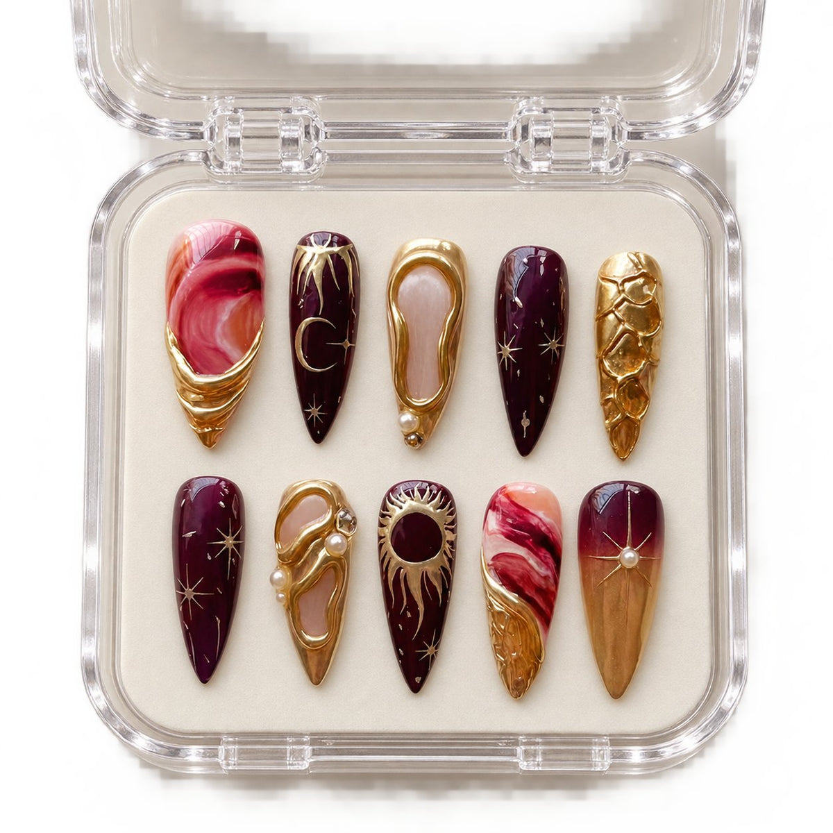 Burgundy and Gold 3D Sculptural Press-On Nails with Marble Swirls in clear acrylic storage box