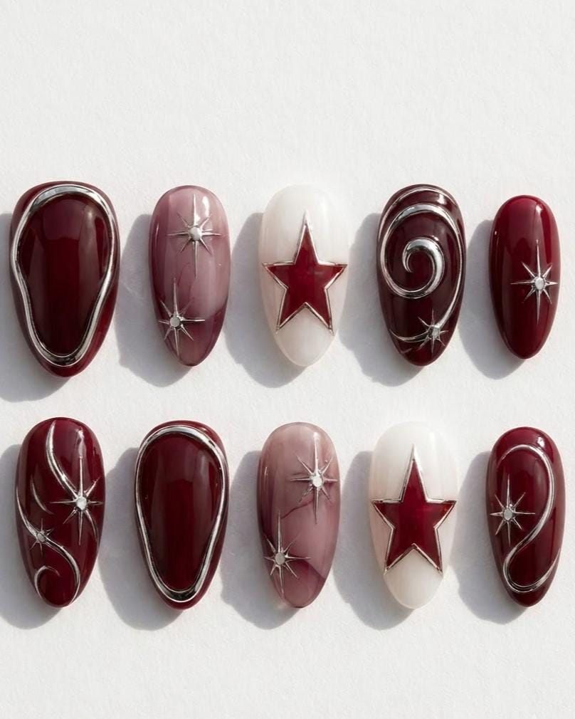 Burgundy and Mauve Celestial Star Nail Set With Silver Swirls