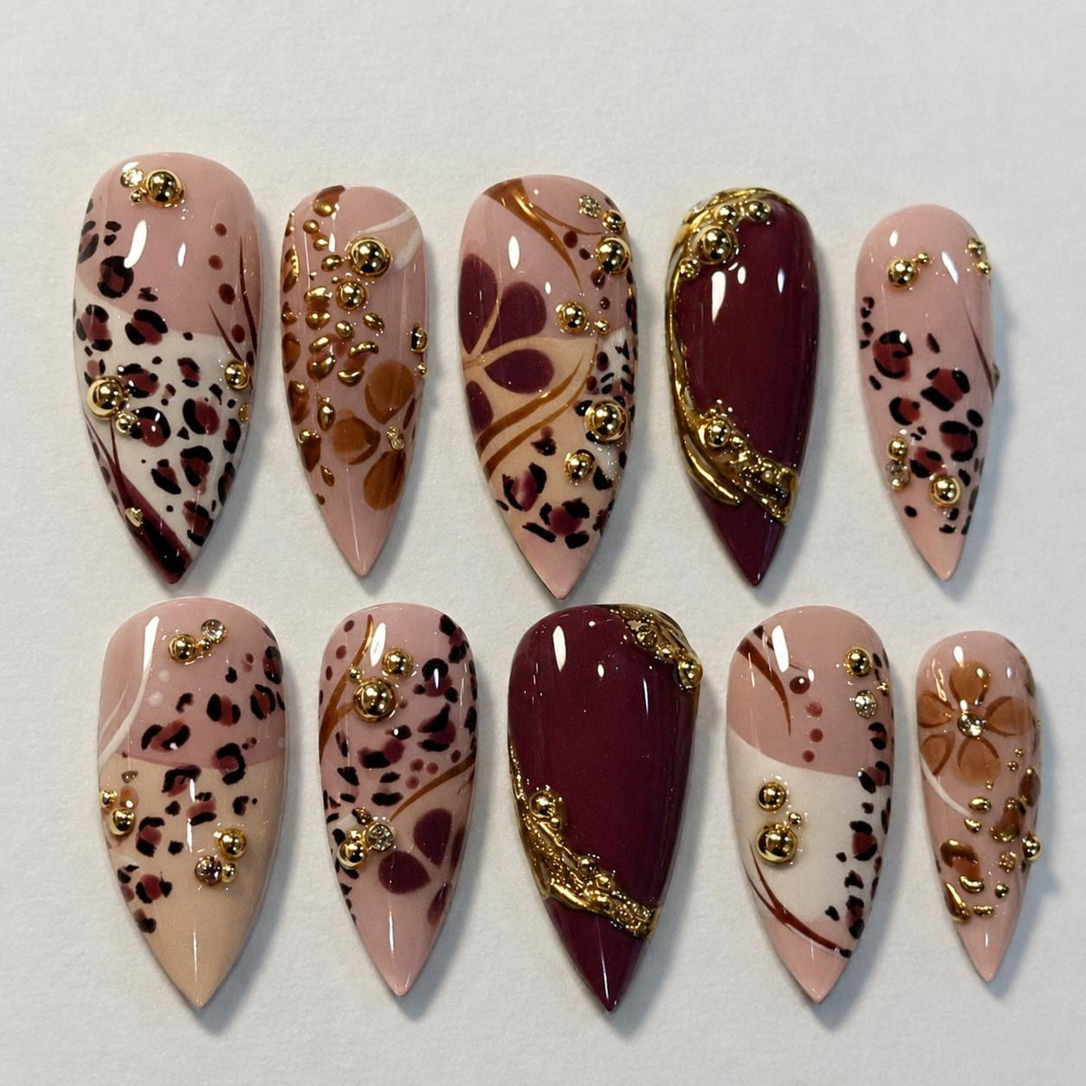 Burgundy and Nude Leopard Print Nail Set With Gold Bead Accents