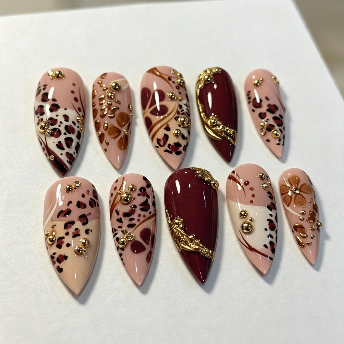 Burgundy and Nude Leopard Print Nail Set With Gold Bead Accents
