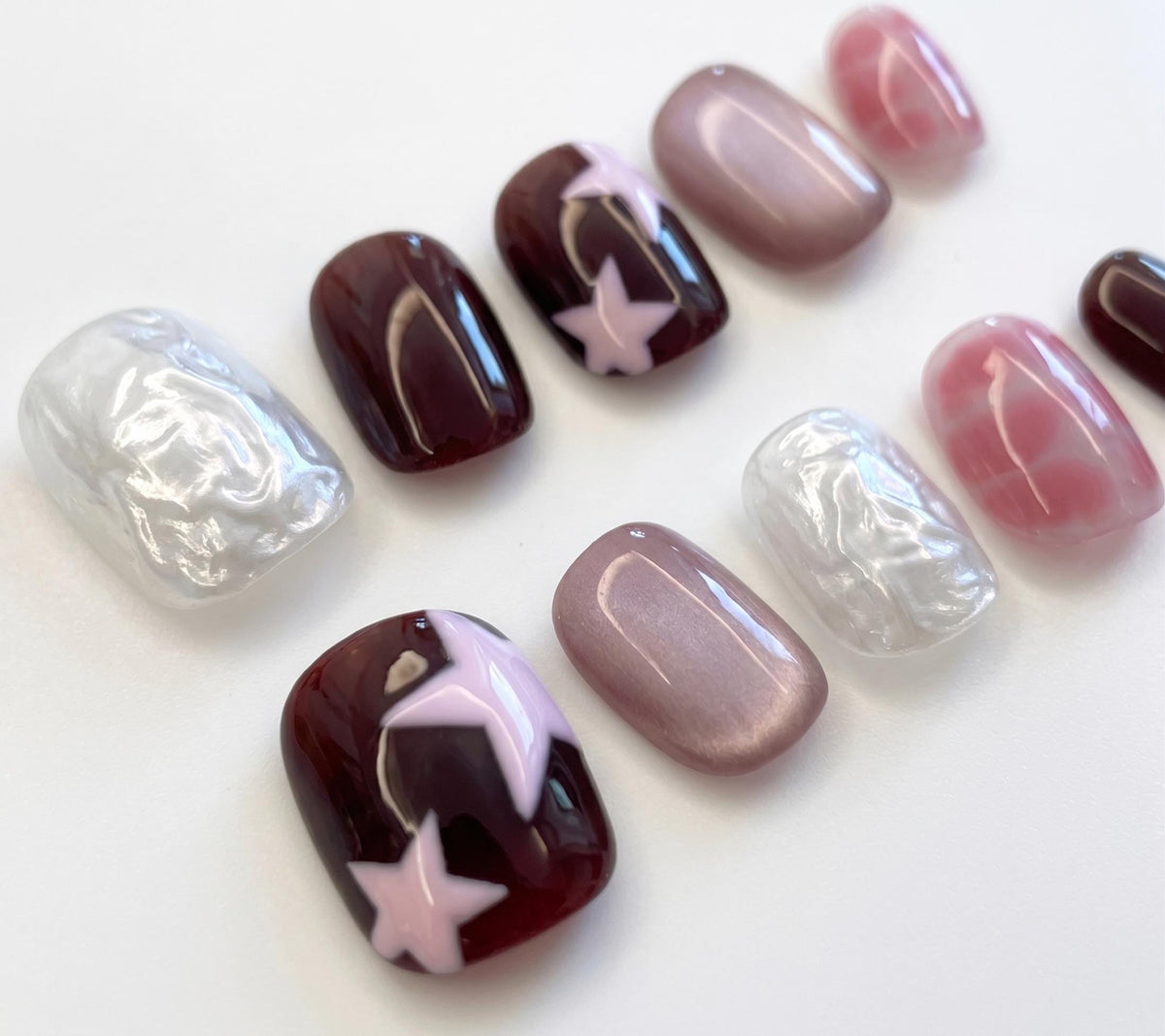 Burgundy and Pink Star Press-On Nails with Iridescent Sculpted Details