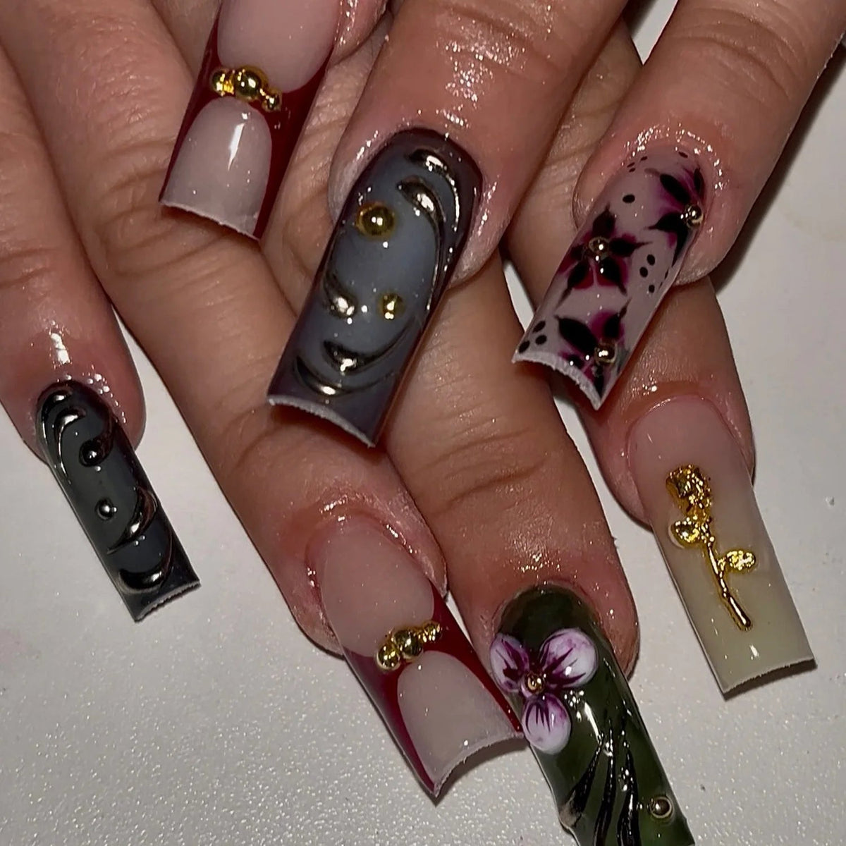 Burgundy, Black and Olive Floral Swirl Nails with Gold Charms