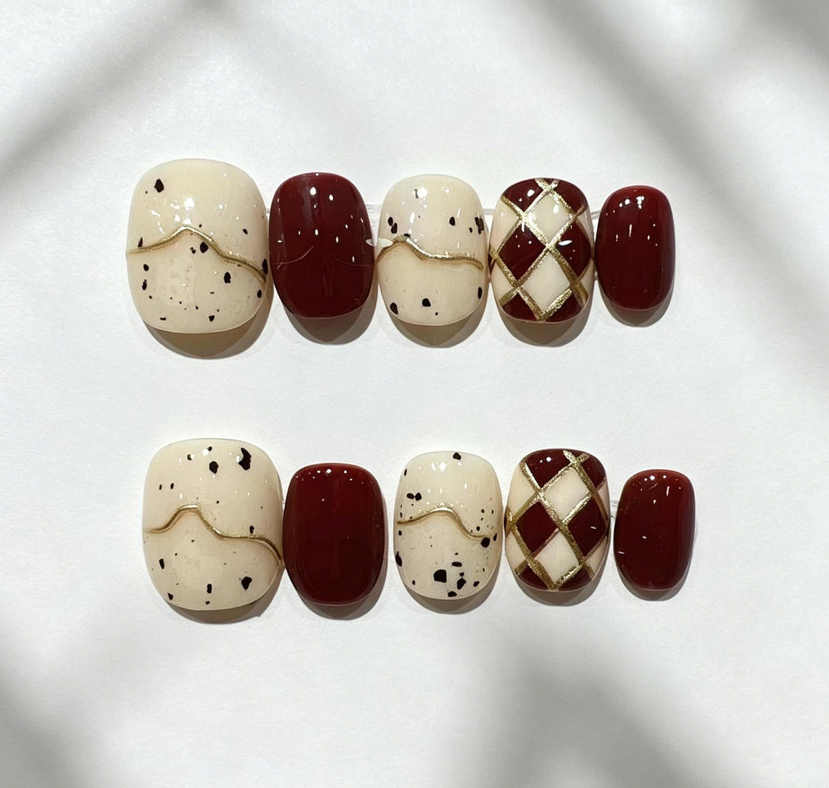 Burgundy Brown and Cream Argyle Press On Nails With Gold Lines