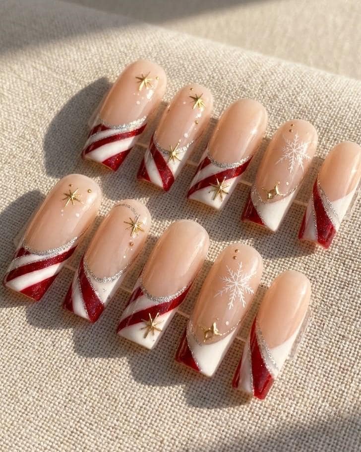 Candy Cane Stripe Christmas Nails with Silver Glitter and Gold Starbursts