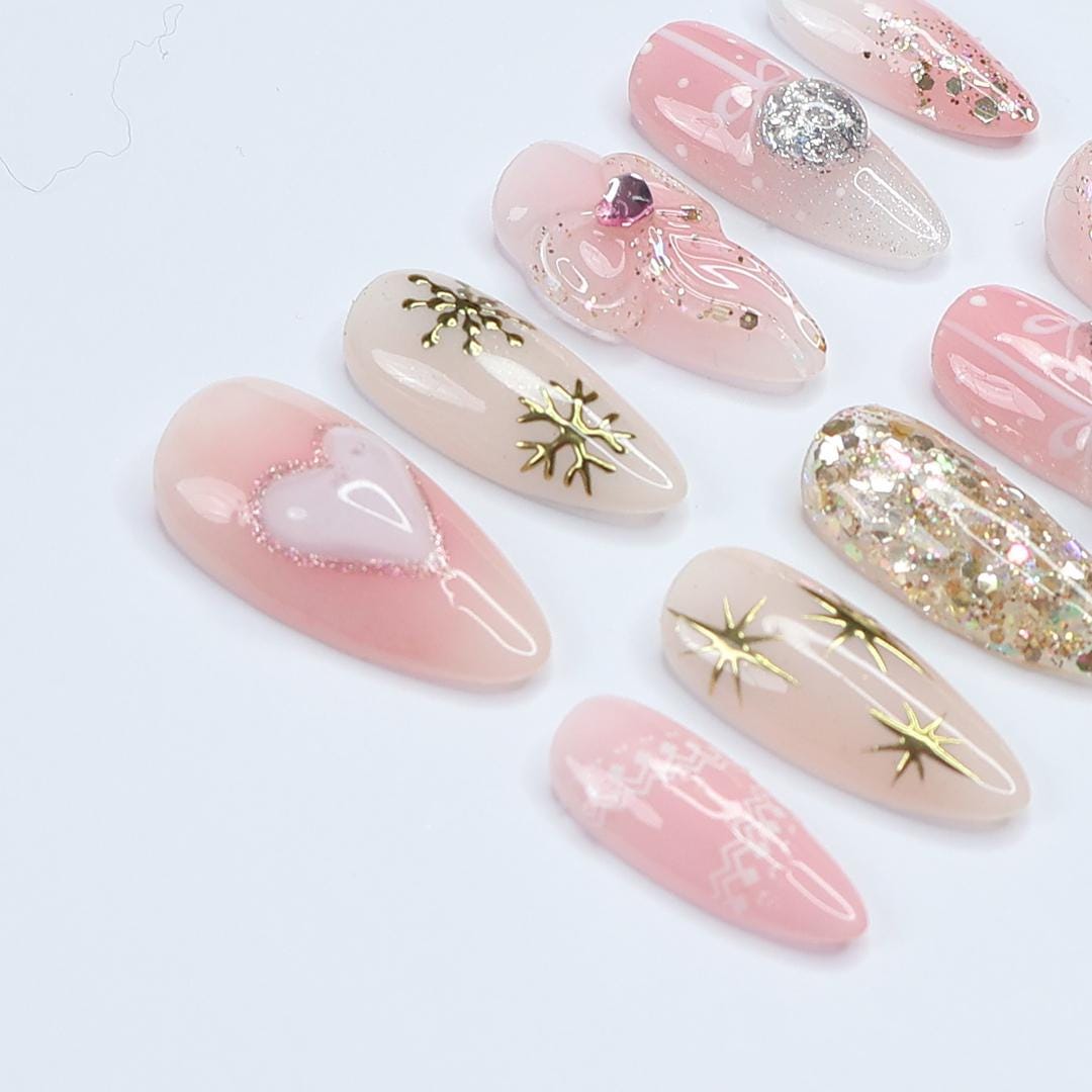 Christmas Pink Press-On Nails with Bows, Glitter, Hearts, and Gold Snowflakes