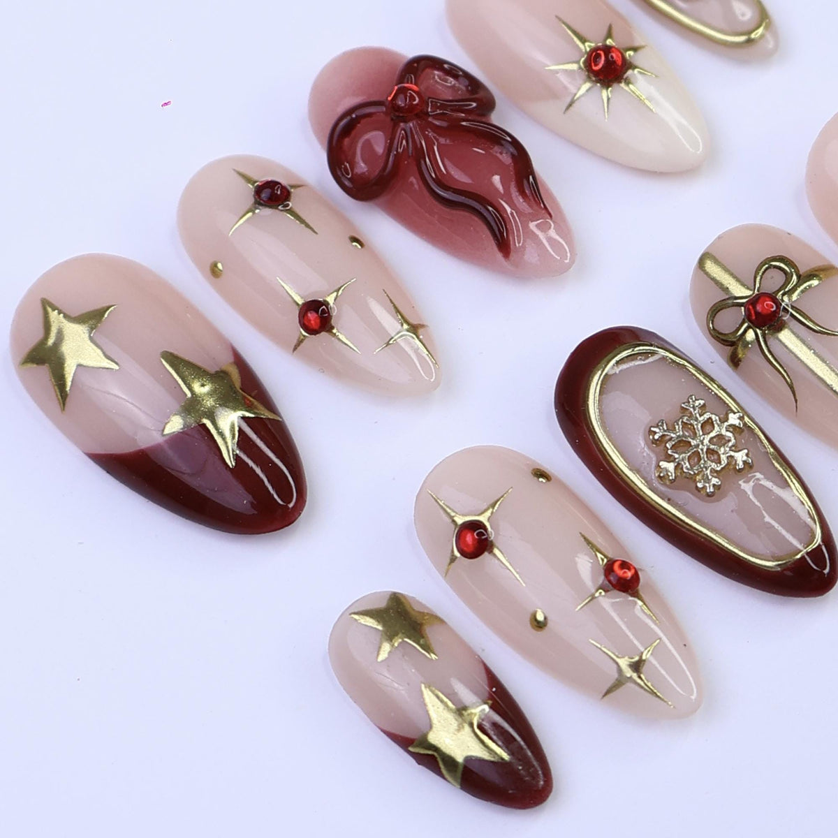 Christmas Press On Nails With Burgundy Bow, Gold Stars and Snowflakes