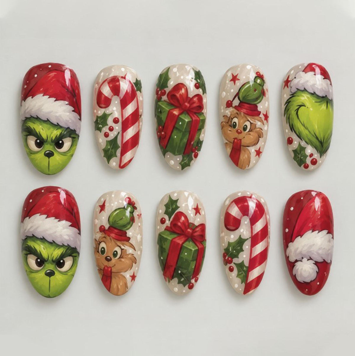 Christmas Press On Nails With Grumpy Green Faces, Candy Canes, Gifts, and Reindeer
