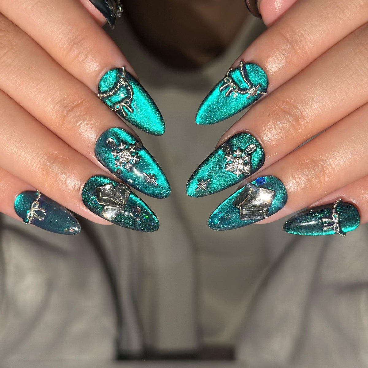 Christmas Winter Teal Cat Eye Press On Nails With Silver Snowflakes, Stars and Bow Charms