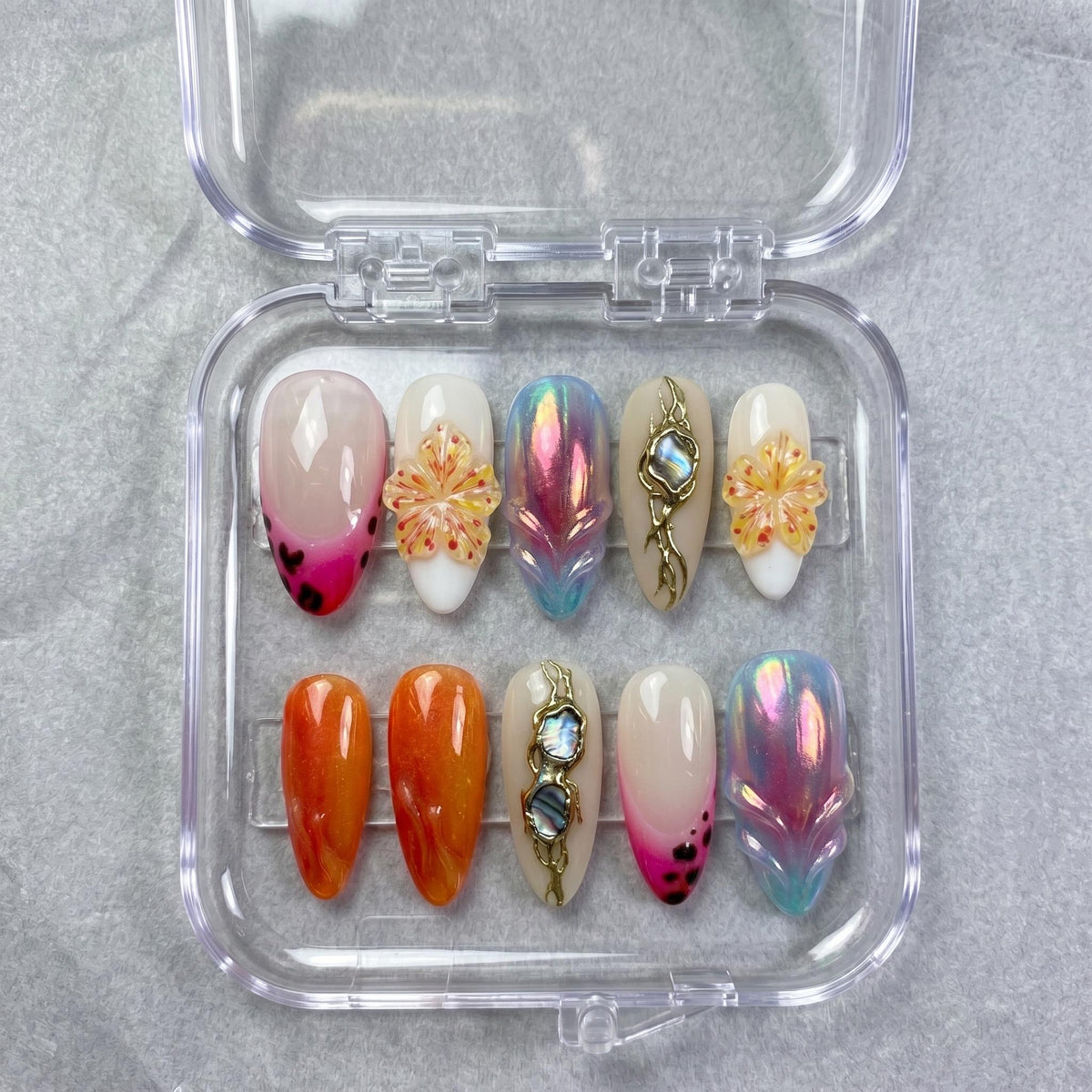 Chrome Aura Flower Press On Nails With Iridescent Accents and Blue Stones